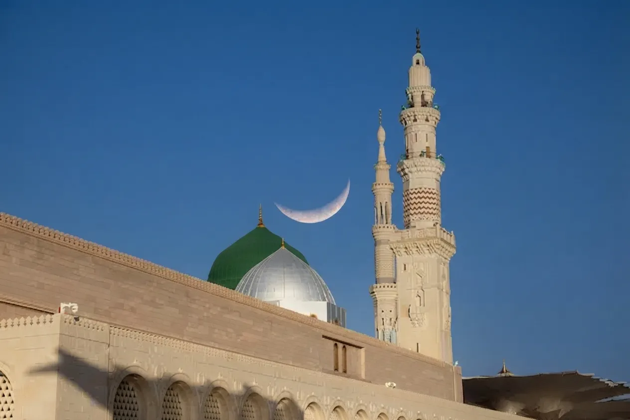 A Crescent Moon Over Madinah's Green Dome